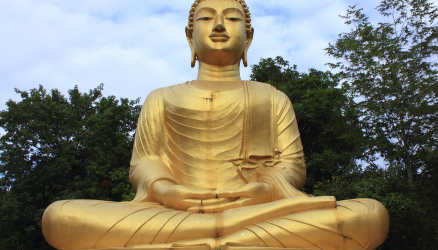 A large gold statue of the Buddha