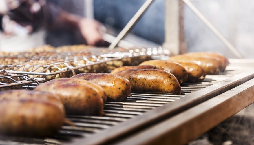 Sausage grilling on a barbecue.