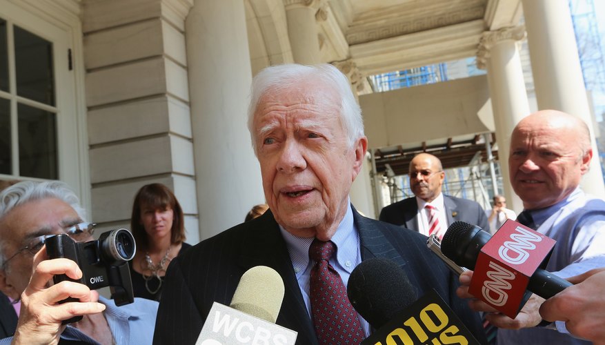 Jimmy Carter speaks to the media.