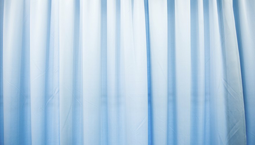 Blue curtains covering a window.