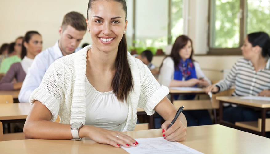 High school student taking test in classroom