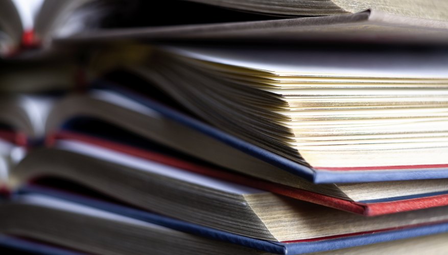 Close-up on pile of text books
