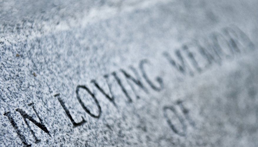 A headstone inscription helps to commemorate a loved one.
