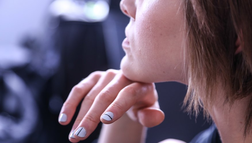 A model shows off her manicure backstage at the JINsoon for Tibi show during New York Fashion Week in September 2013.
