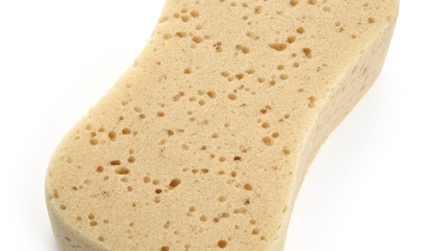 A sponge helps to clean cloudy rings off of ceramic hobs.