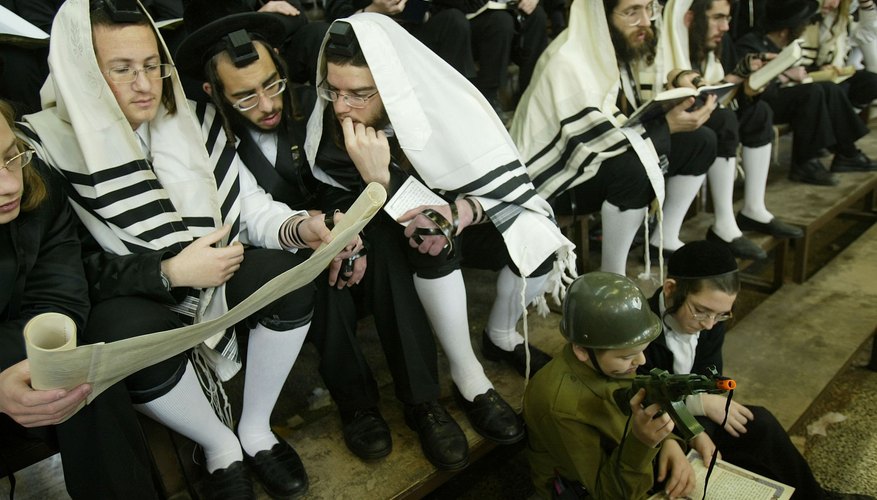 Ultra-Orthodox Jews read from the Book of Esther during Purim in Israel