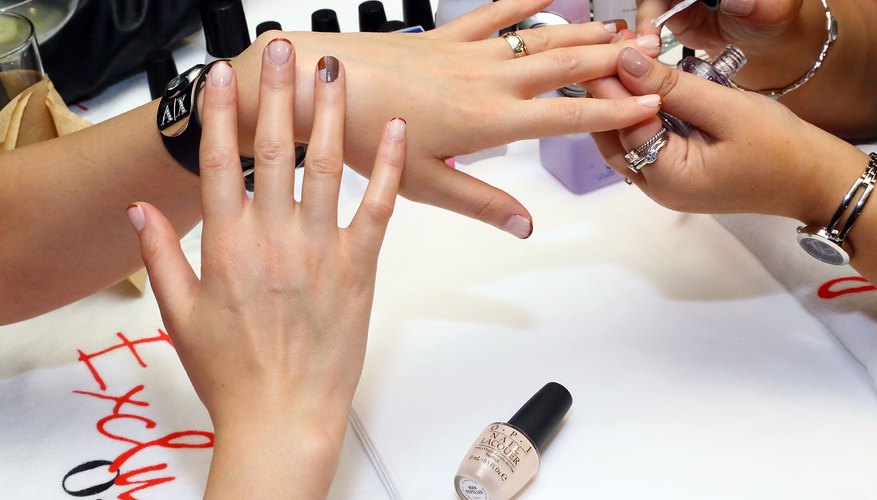 Jazz up a regular manicure by embellishing with loose glitter.