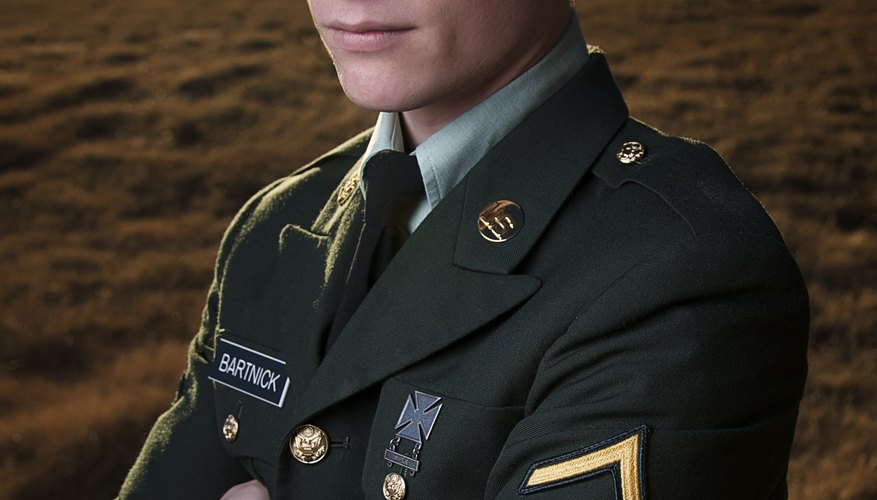 An ROTC student in full uniform standing outside