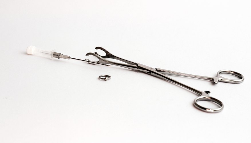 Piercing needle and supplies.