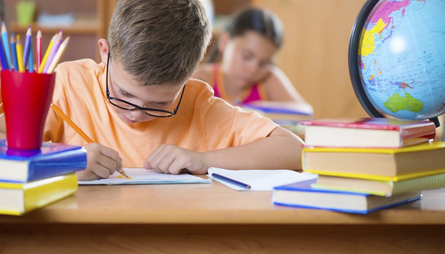 Young students are taking a test.