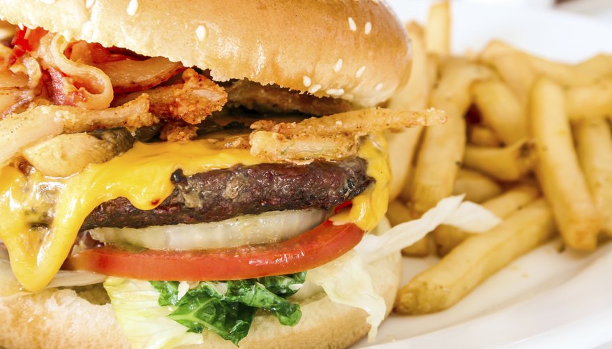 A cheeseburger with french fires.