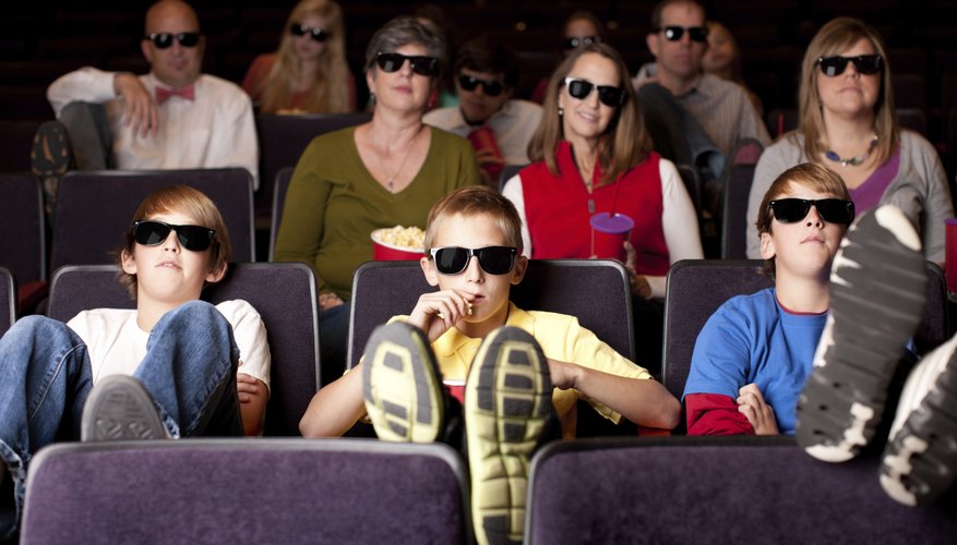Teenagers watching a movie.