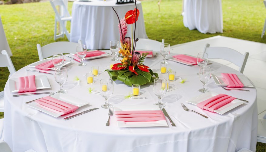 The natural landscape invites crisp linens and fresh flowers on the tables.