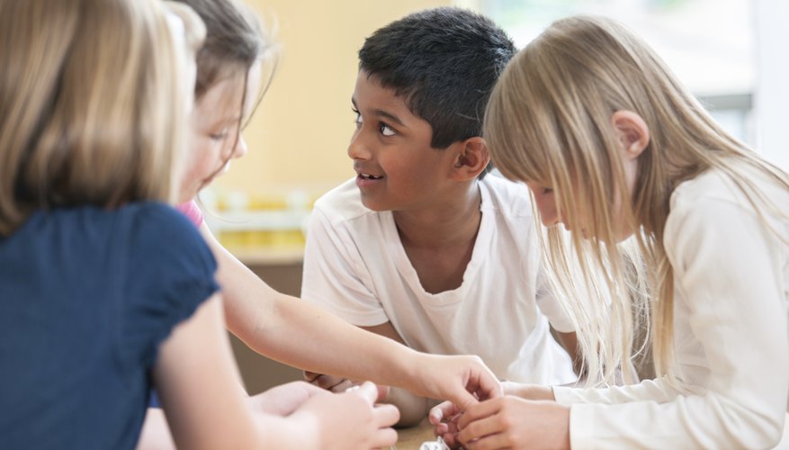 Young kids playing a game at school.