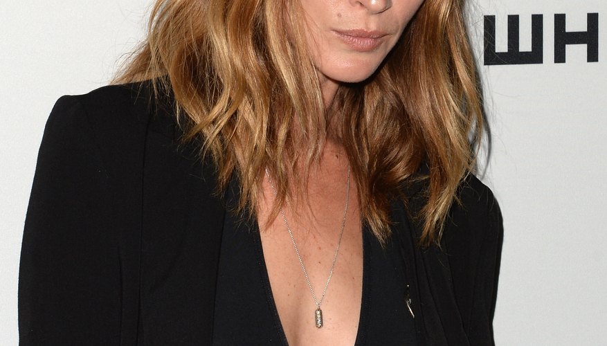 Model Erin Wasson's unkempt curls are a key element to her boho-chic style.