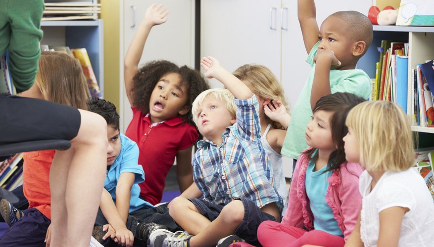 Excited children in the classroom.
