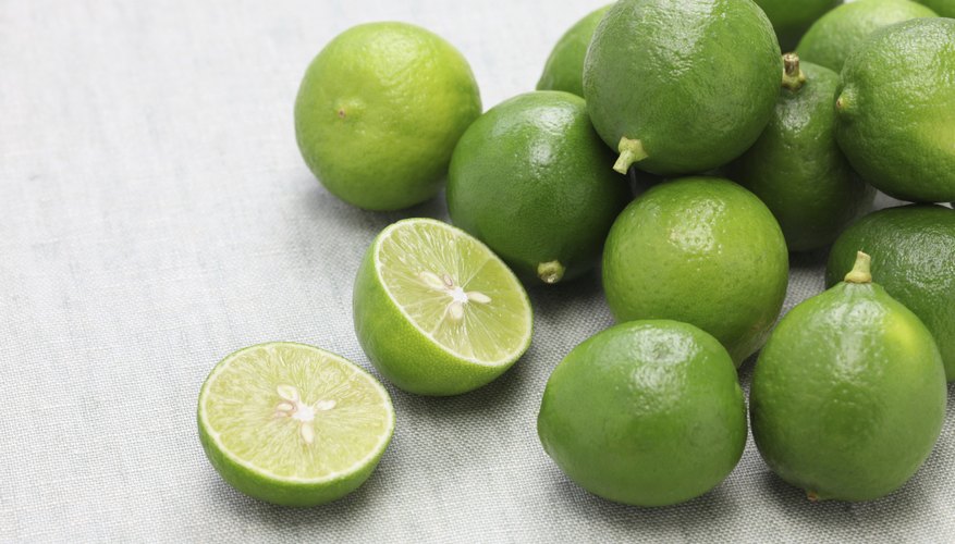 Fresh key limes on a table.