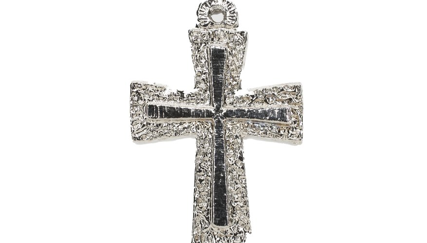 Pendants and charms can be engraved to commemorate the baptism.
