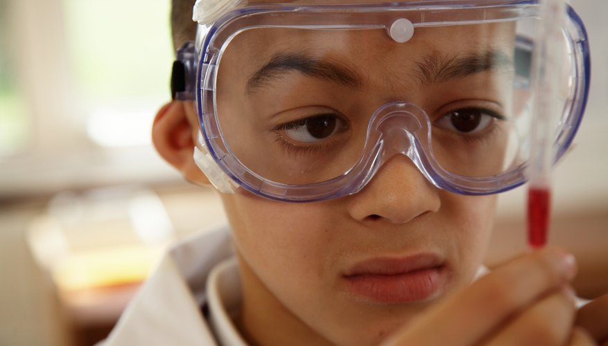 Young boy wearing safety goggles