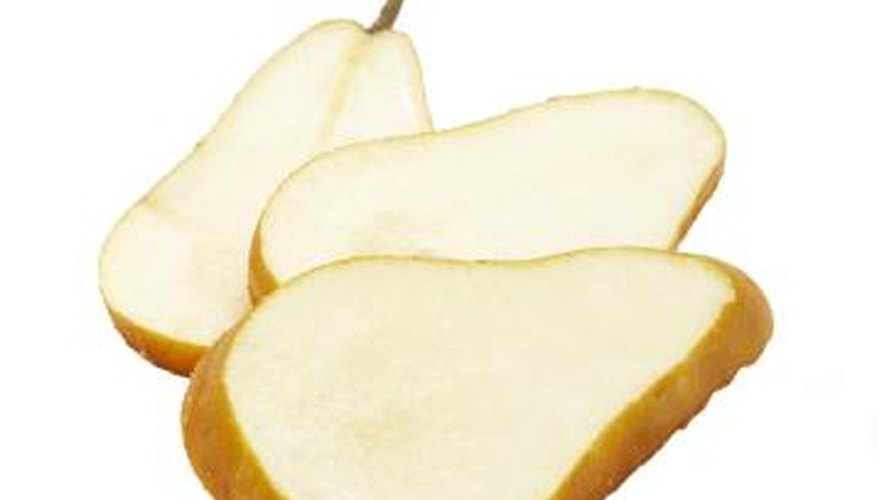 Fan-cut a pear for a cheese plate garnish.