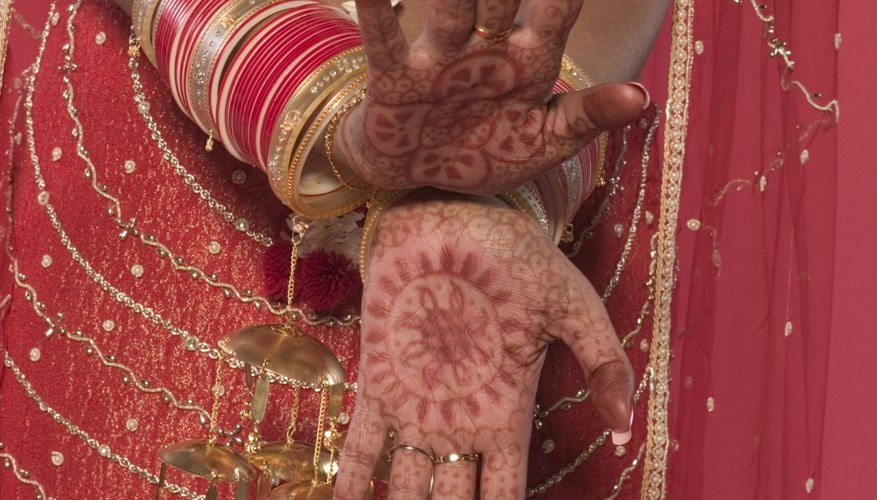 Muslim brides in the Asian subcontinent often have henna tattoos painted on their hands and feet for the wedding ceremony.