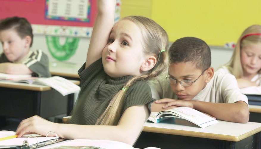 In coed schools, girls often have to fight for academic attention.