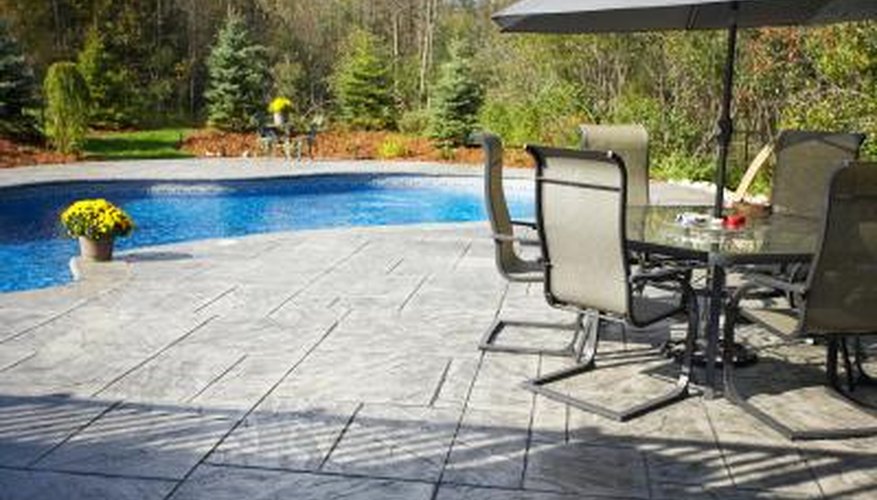 Stamped concrete is an inexpensive alternative to flagstone for a patio.