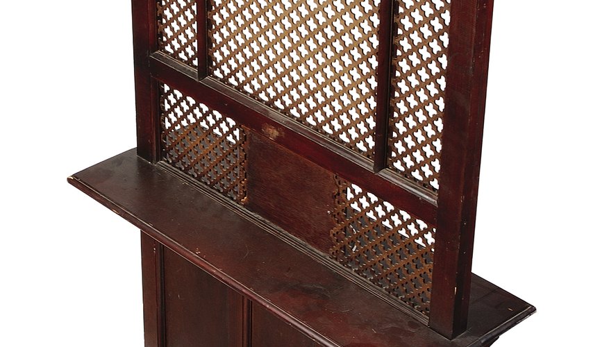 Confession traditionally took place in a confessional booth or behind a screen.