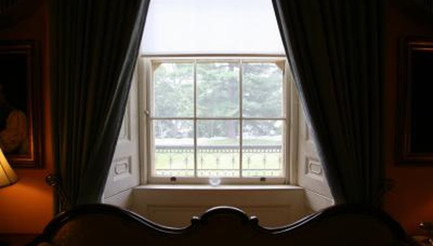 Formal curtains with matching fabric tiebacks accentuate a window.