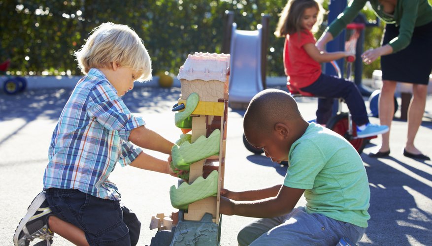 Students playing on playground after school