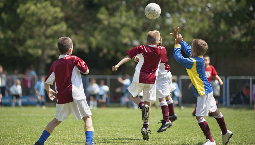 Boys playing soccer.