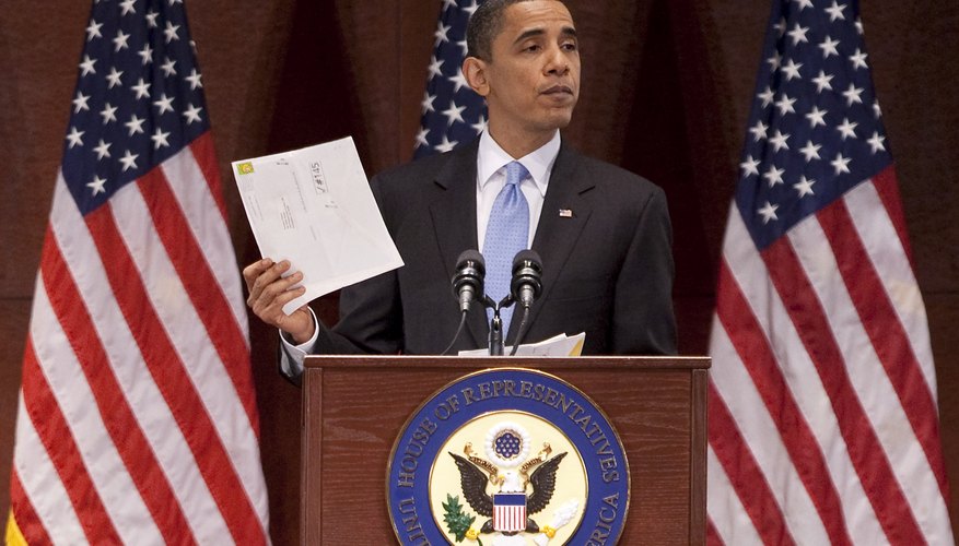 President Barack Obama displays a citizen's letter received in 2010.
