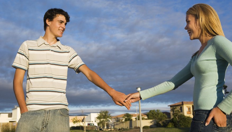Holding hands is an appropriate way to show affection in most situations.
