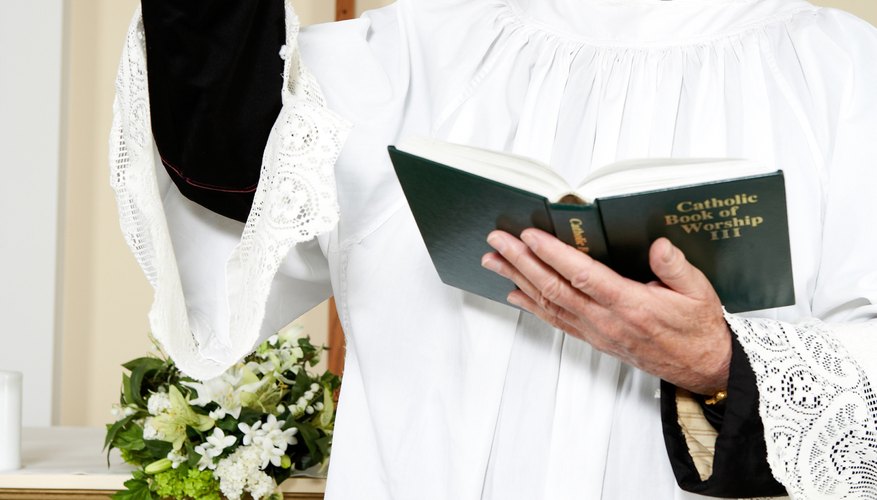 A priest follows the sacramentary from the Mass's opening prayers to its closing prayers.
