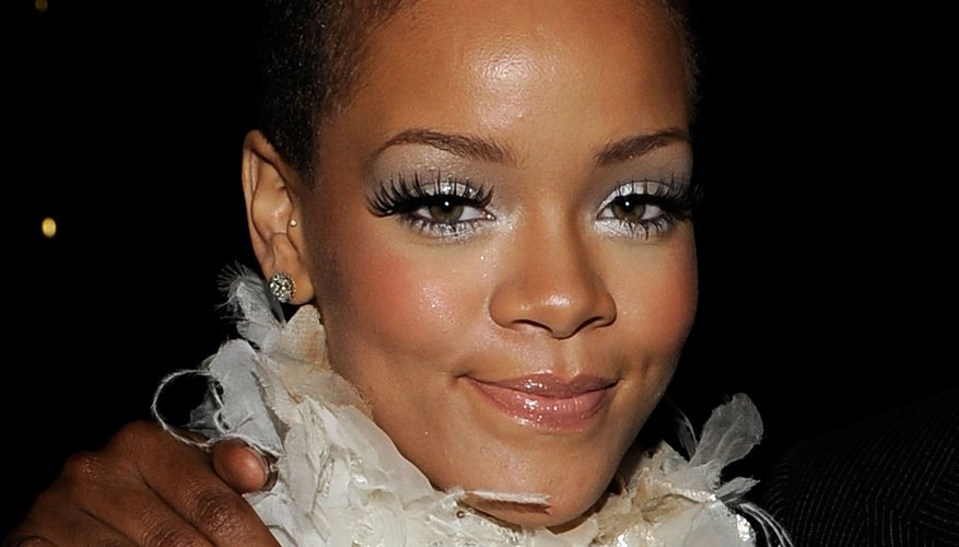 Rihanna's long mohawk allows for wavy styling that creates a feminine look.