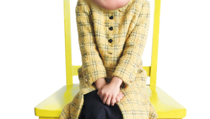 Plaid overcoats mixed with skirts and retro sneakers spells cool hipster gals.
