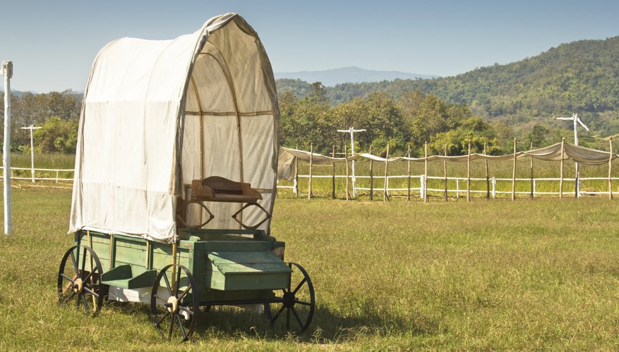 Pioneer wagon in a field.