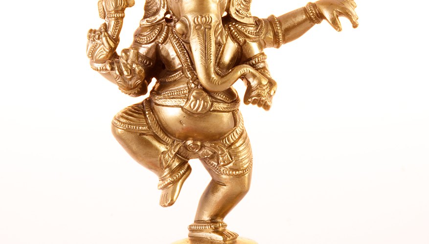 A dancing four-armed Ganesh is a popular and powerful Hindu god.