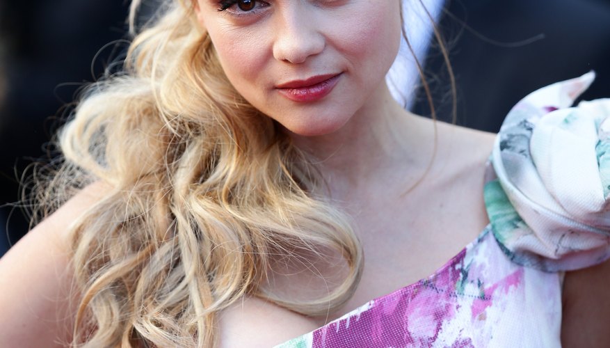 Beatrice Rosen looks lovely wearing her hair in a side swept, curled ponytail.
