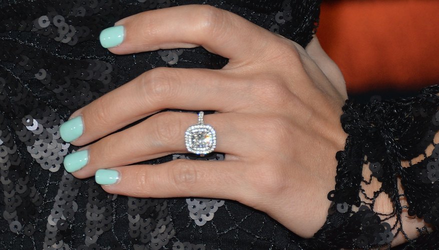 Contrast a soft blue pastel nail polish with lacy black evening wear.