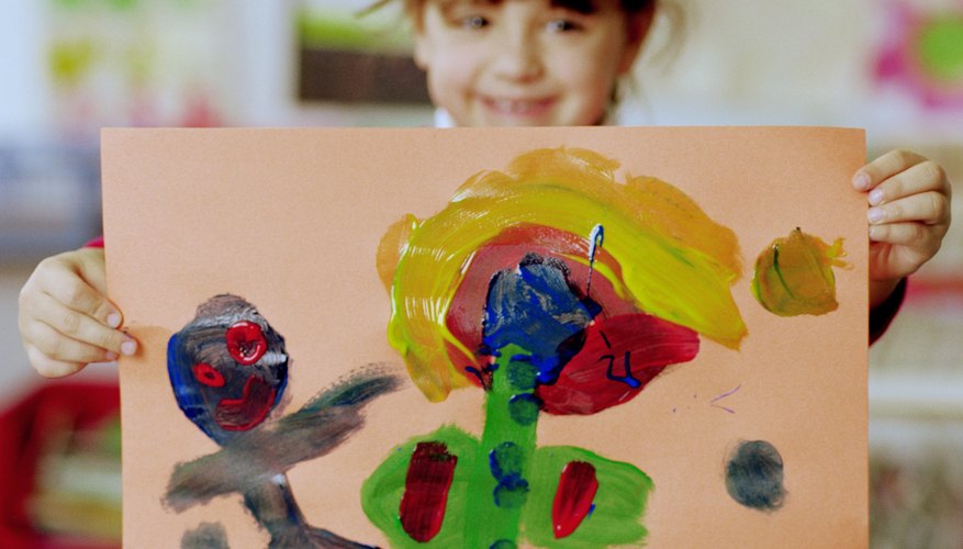 Little girl with painting