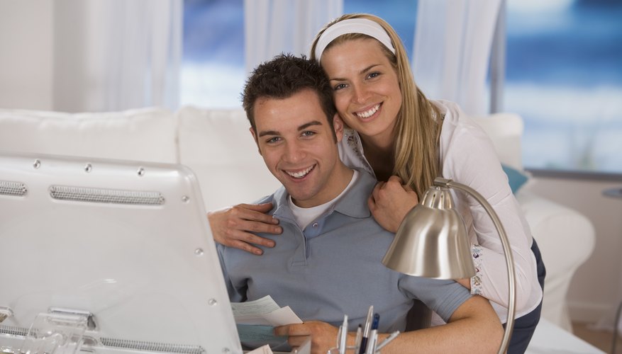 Many couples open joint checking accounts to pay shared bills.