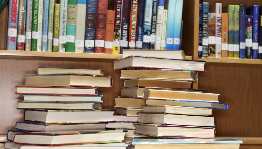 Show students how call numbers can help them find books.