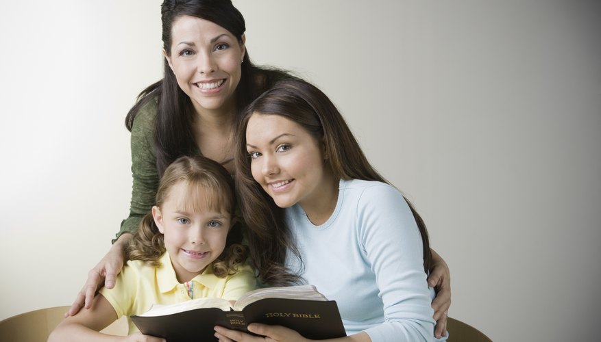 A young child and her teachers are learning the bible.