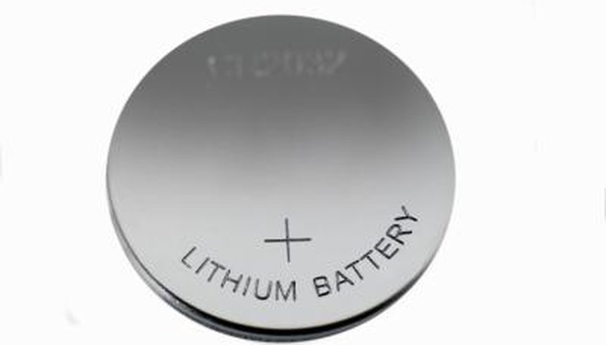 One side of a button cell battery is always marked with a 