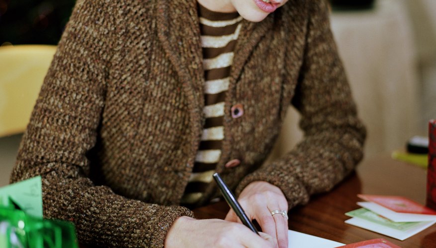 You should always personally sign greeting cards, including those sent to business associates.