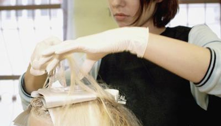 Strip unwanted hair colour out of your hair with hydrogen peroxide.