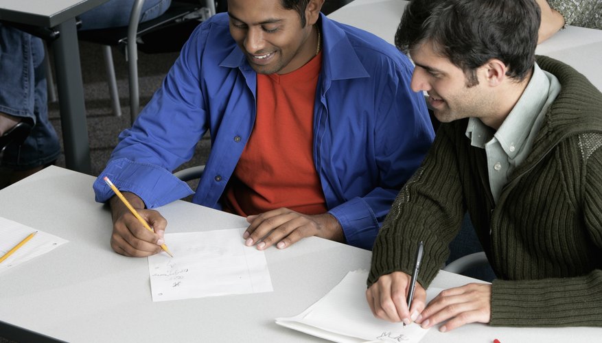 College students comparing notes.