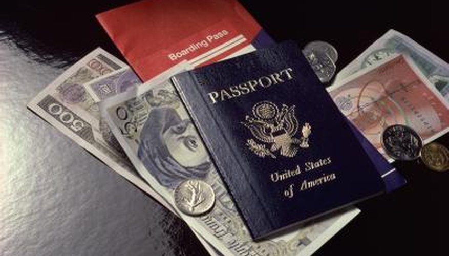 Destroy an old passport to prevent fraud.