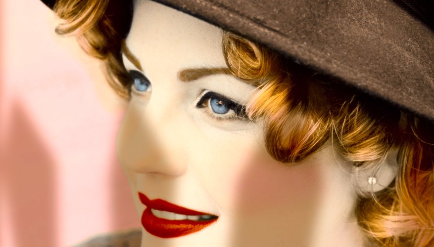 Pair a 1950's brimmed hat with a head of playful curls.